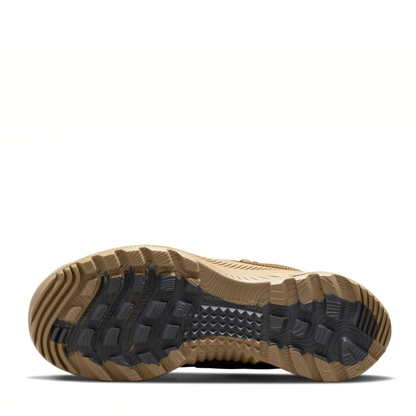 Close-up view of the multi-directional lug pattern on the outsole of the Nike React SFB Carbon Mid Coyote Tactical Boots.