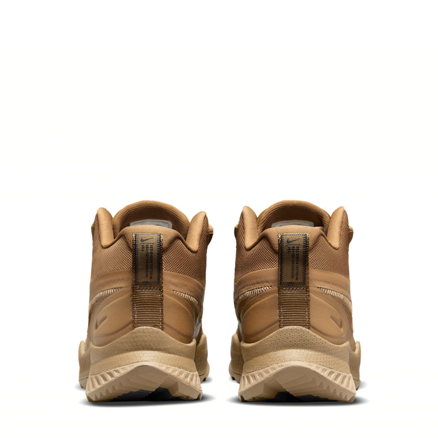 Detailed shot of the rear heel construction and external chassis support on the Nike React SFB Carbon Mid Coyote Tactical Boots.